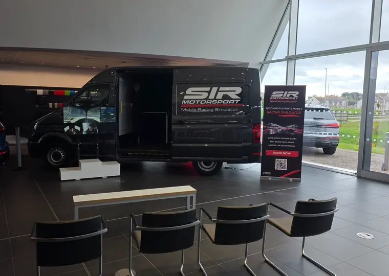 SIR Motorsport setup inside a premium venue